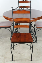 Load image into Gallery viewer, 5 Piece Round Wood and Wrought Iron Dining Set with Leaf
