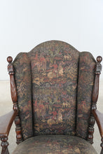 Load image into Gallery viewer, Mayhew Antique Carved Oak Wingback Armchair with Tapestry Upholstery and Casters
