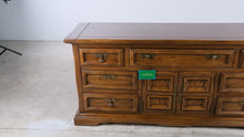 Load and play video in Gallery viewer, United Furniture Solid Oak Triple Dresser with Center Cabinet and Nine Drawers - Online Only
