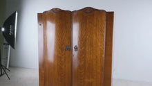 Load and play video in Gallery viewer, Vintage Oak Armoire Wardrobe Cabinet with Carved Crown and Double Doors
