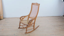 Load and play video in Gallery viewer, Antique Wood Cane Seat and Back Rocking Chair with Scroll Arms

