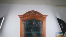 Load and play video in Gallery viewer, Traditional Carved Wood Curio Cabinet with Glass Shelves and Side-Loading Door
