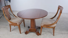 Load and play video in Gallery viewer, Hooker Furniture Abbott Place Round Pedestal Dining Table with Two Chairs
