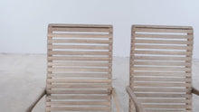Load and play video in Gallery viewer, Pair of Slatted Wood Outdoor Rocking Chairs

