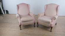 Load and play video in Gallery viewer, Pair of Pale Pink Reclining Wingback Chairs

