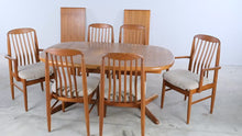 Load and play video in Gallery viewer, Vintage Solid Teak Mid Century Modern Dining Table and 6 Chair Set with 2 Leaves - Online Only
