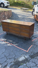 Load and play video in Gallery viewer, Mid Century Modern Dixie Walnut Triple Dresser with Tapered Legs
