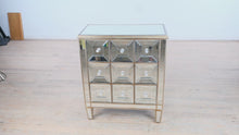 Load and play video in Gallery viewer, Glam Mirrored 9-Drawer Chest with Beveled Panels
