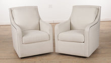 Load and play video in Gallery viewer, Pair of Swiveling Annie Anne Arm Chairs
