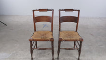 Load and play video in Gallery viewer, Pair of Antique Rush Seat Ladder Back Dining Chairs with Turned Legs
