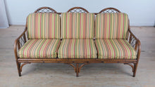 Load and play video in Gallery viewer, Rattan Sofa with Bright Striped Upholstery and Matching Accent Pillows
