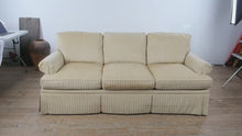 Load and play video in Gallery viewer, Southwood Upholstered Sofa with Neutral Striped Fabric and Skirted Base
