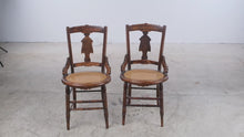Load and play video in Gallery viewer, Pair of Antique Eastlake Carved Wood Cane Seat Side Chairs
