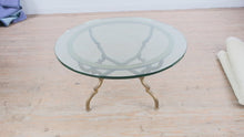 Load and play video in Gallery viewer, 36 Inch Round Glass Top Coffee Table with Iron Base and Brass Ring Frame
