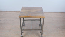 Load and play video in Gallery viewer, Industrial Steel and Wood Side Table with Casters and Mesh Shelf by Go Home
