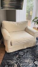 Load and play video in Gallery viewer, Arhaus Oversized Slipcovered Chair 48 Inch in Cream
