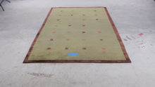 Load and play video in Gallery viewer, Hand Woven Wool Area Rug Olive Green Brown Geometric Squares 62 x 96
