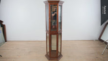 Load and play video in Gallery viewer, Home Meridian Mahogany Finish Lighted Corner Curio Cabinet with Glass Shelves

