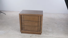 Load and play video in Gallery viewer, Havertys Wood Three Drawer Nightstand with Power Outlet and USB Charging
