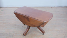 Load and play video in Gallery viewer, Antique Rotating Top Drop Leaf Coffee Table with Casters
