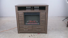 Load and play video in Gallery viewer, Ashley Juararo B251-49 Rustic Media Chest with Electric Fireplace
