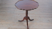 Load and play video in Gallery viewer, Brandt Mahogany Pie Crust Accent Table with Duncan Phyfe–Style Legs and Brass Claw Feet

