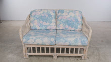 Load and play video in Gallery viewer, Vintage Rattan Four-Piece Living Room Set with Floral Upholstery and Glass Tables
