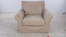 Load and play video in Gallery viewer, Oversized Beige Slipcovered Armchair with Rolled Arms
