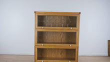 Load and play video in Gallery viewer, Oak Barrister Bookcase with Leaded Glass Top Door
