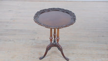 Load and play video in Gallery viewer, The Acanthus Crest Pie Crust Table – Triple Pedestal Mahogany Accent

