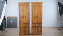 Load and play video in Gallery viewer, Pair of Vintage Oak Storage Cabinets with Pull Out Table and Drawer Storage
