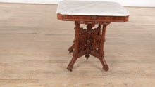 Load and play video in Gallery viewer, Intricately Carved Eastlake Tea / Foyer Table - Marble Top
