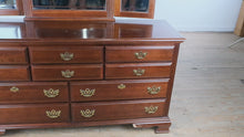 Load and play video in Gallery viewer, Jordan Cherry Chippendale Dresser with Folding Mirror – by American Drew

