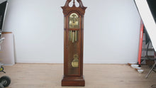 Load and play video in Gallery viewer, Howard Miller 61st Anniversary Grandfather Clock – Traditional Cherry Wood Longcase Clock
