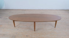 Load and play video in Gallery viewer, Mersman Mid Century Modern Oval Walnut Coffee Table with Tapered Legs
