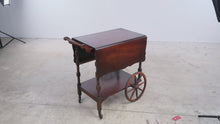Load and play video in Gallery viewer, Vintage Mahogany Drop-Leaf Tea Cart with Spoked Wheels
