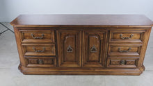 Load and play video in Gallery viewer, Traditional Walnut Triple Dresser with Nine Drawers and Center Cabinet
