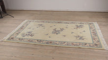 Load and play video in Gallery viewer, Papillon Hand Woven Wool Rug - 68&quot; x 112&quot;

