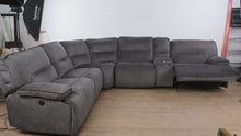 Load and play video in Gallery viewer, Havertys Reynolds Charcoal Power Reclining Sectional Sofa with Console Storage and Cup Holders
