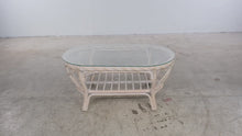 Load and play video in Gallery viewer, Vintage Rattan Four-Piece Living Room Set with Floral Upholstery and Glass Tables
