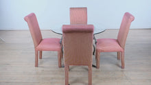 Load and play video in Gallery viewer, 42&quot; Round Glass Top Dining Set with Swan Base and 4 Parsons Chairs
