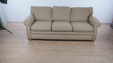 Load and play video in Gallery viewer, Beige Upholstered Sleeper Sofa with Rolled Arms and Pull Out Bed
