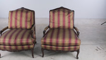 Load and play video in Gallery viewer, Pair of Hancock and Moore Mahogany Lounge Chairs with Striped Upholstery
