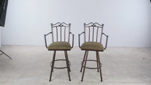 Load and play video in Gallery viewer, Set of Three Metal Swivel Bar Stools with Arms and Upholstered Seats
