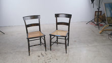Load and play video in Gallery viewer, Antique Hitchcock Style Black Gold Floral Stenciled Cane Seat Chairs Pair
