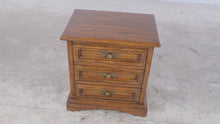 Load and play video in Gallery viewer, United Furniture Solid Oak Three-Drawer Nightstand
