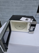 Load image into Gallery viewer, Oster 0.9 Cu. Ft. Countertop Microwave – Model OGHS9001, Stainless Steel Finish
