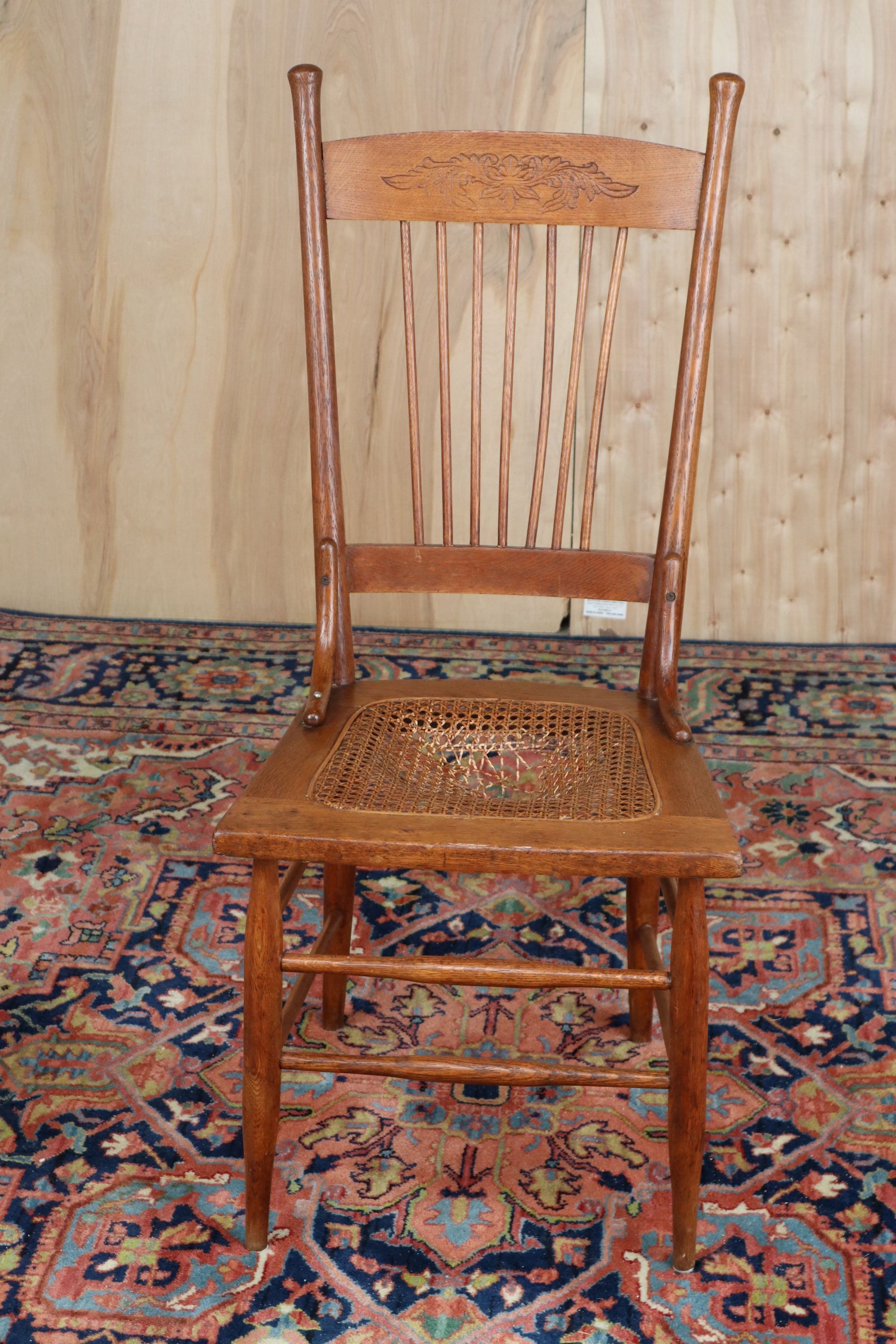 Antique Oak Chair with Cane Seat and Pressed Back Craze