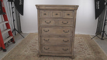 Load and play video in Gallery viewer, Tinley Park Dovetail Grey Chest of Drawers - Magnussen - Showroom Sample
